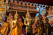 Chiang Mai - Wat Phra That Doi Suthep. The innercourtyard of the temple is filled with Buddha statues and other religious paraphenalia. 